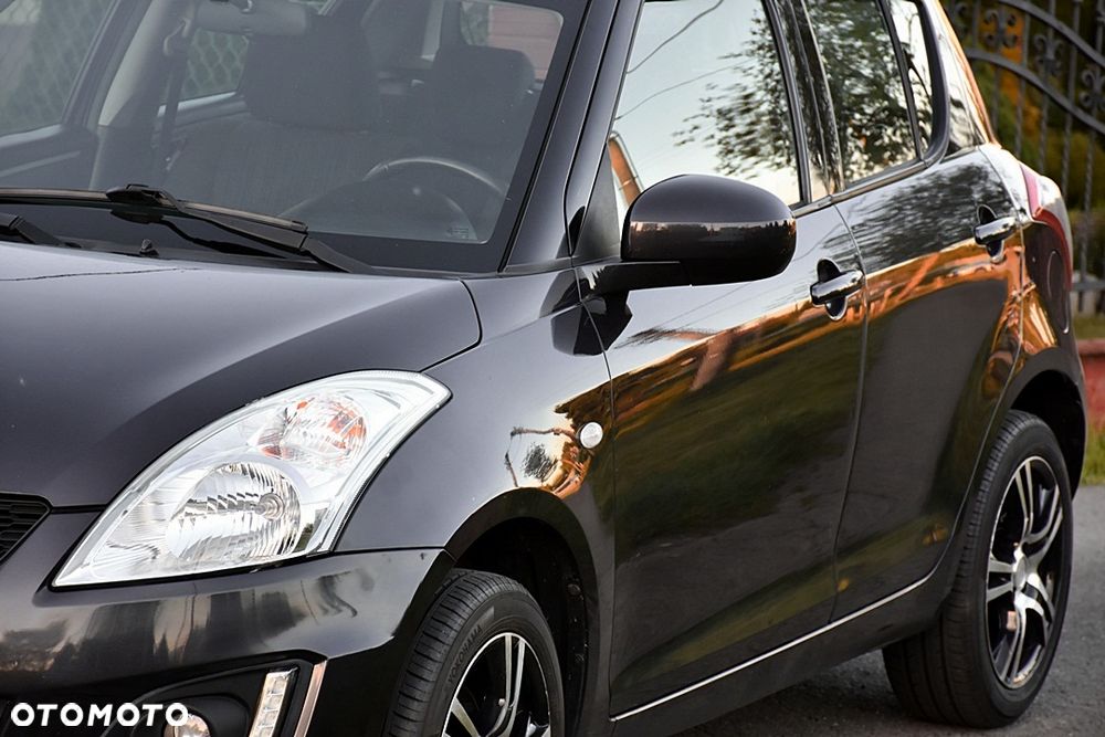 Suzuki Swift 1.2 4x4 Club - 10