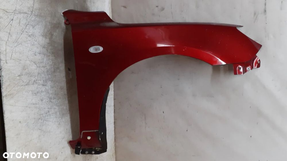 * MAZDA 3 I BŁOTNIK PRZÓD PRZEDNI PRAWY BORDOWY - 1