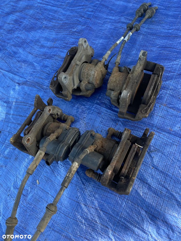 AUDI A4 B8 A5 8T Q5 2.0 TFSI ZACISK HAMULCOWY LEWY PRAWY TYŁ TYLNY KOMPLET  32335478 - 4