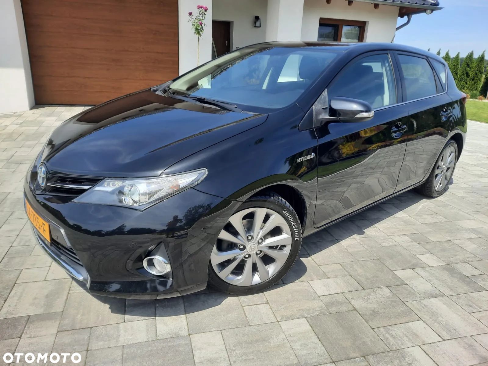 Toyota Auris 1.8 VVT-i Hybrid Automatik Edition - 1
