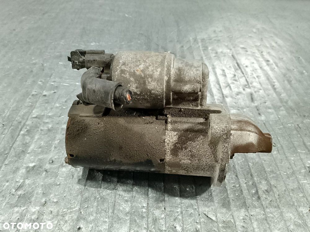 ROZRUSZNIK KIA RIO III 36100-03301 1201973 1.2 16V - 4