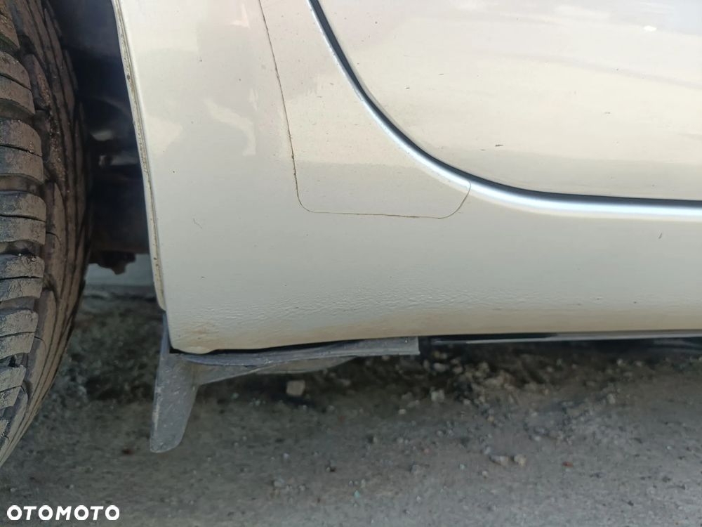 TOYOTA YARIS II 05-11 LIFT 2009 r. 1E7 5D HB błotnik ćwiartka prawy tył PT - 2