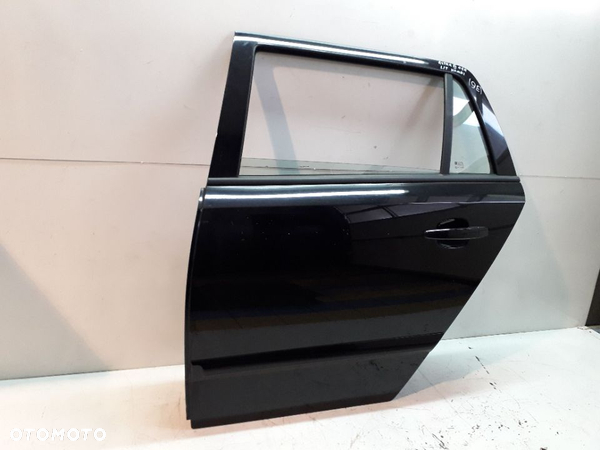 OPEL ASTRA III KOMBI 05R DRZWI LEWE TYŁ MANUALNE