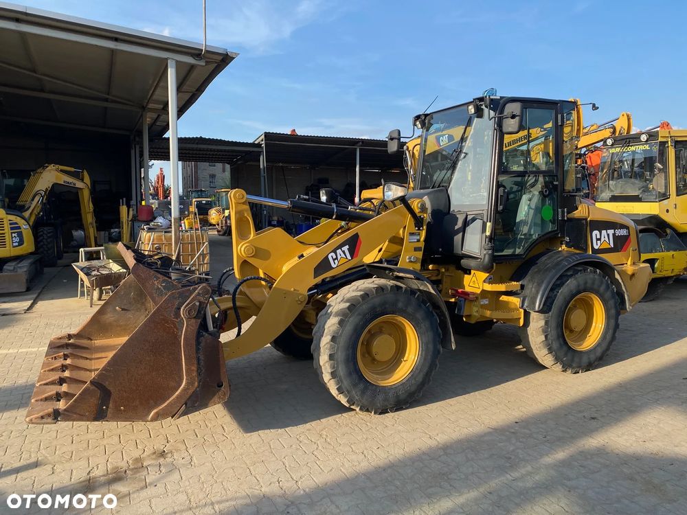 Caterpillar CAT 908H2, 6200 MTH, ŁYŻKA OTWIERANA + WIDŁY, z NIEMIEC, - 1