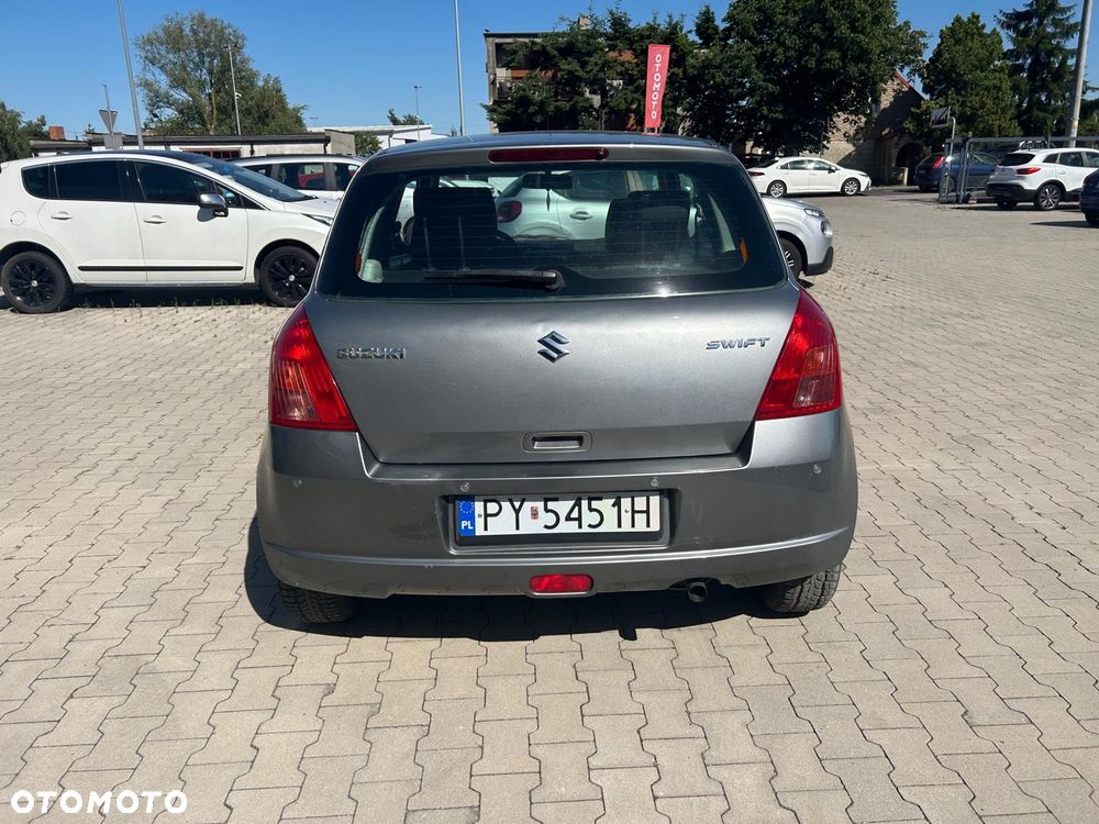 Suzuki Swift 1.3 Club - 8