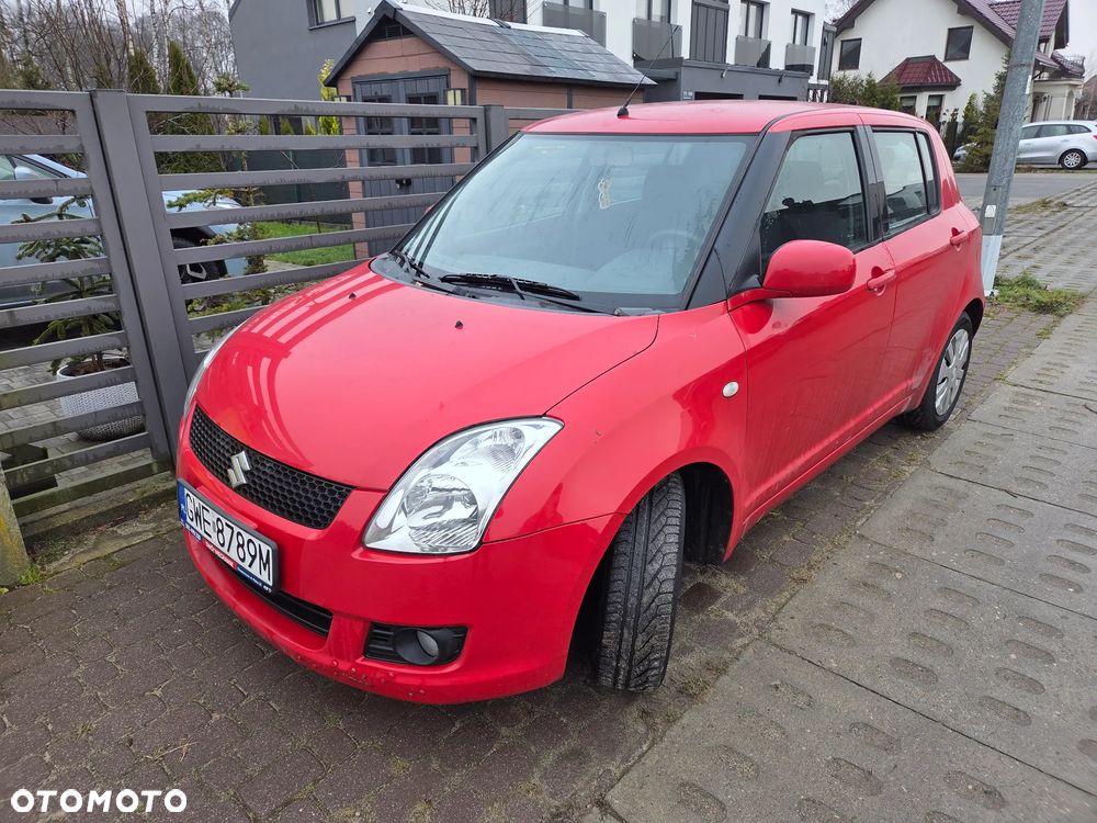 Suzuki Swift 1.3 Sakura - 1