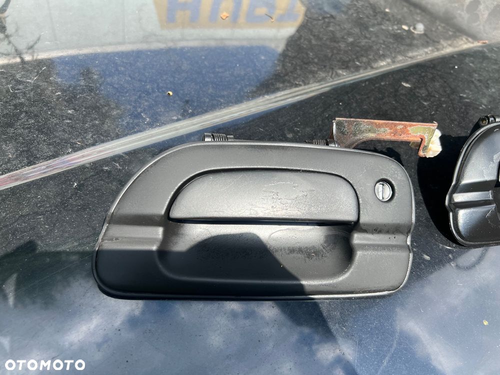 Klamka lewa prawa zewnętrzna ssangyong korando 2.9td