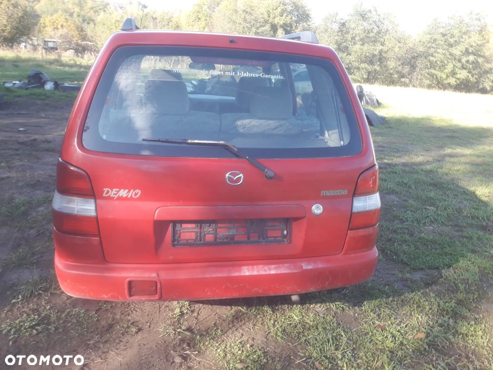Mazda Demio 97-Klapa Zderzak tylny szybapas  lampa belka Kolor SU - 5