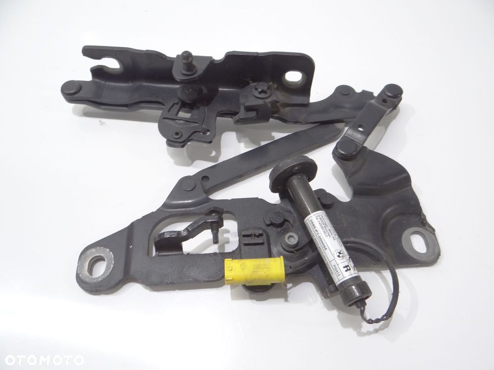 ZAWIAS MASKI NABÓJ PRAWY PRZÓD BMW F11 7249888 668 - 2