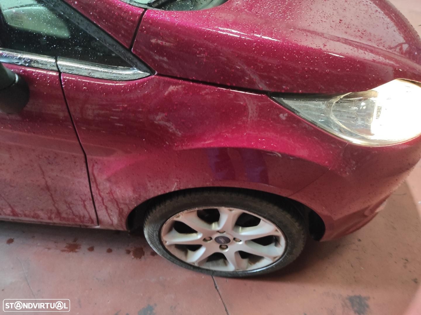 GUARDA-LAMAS FRENTE DIREITO FORD FIESTA CB1 - 1