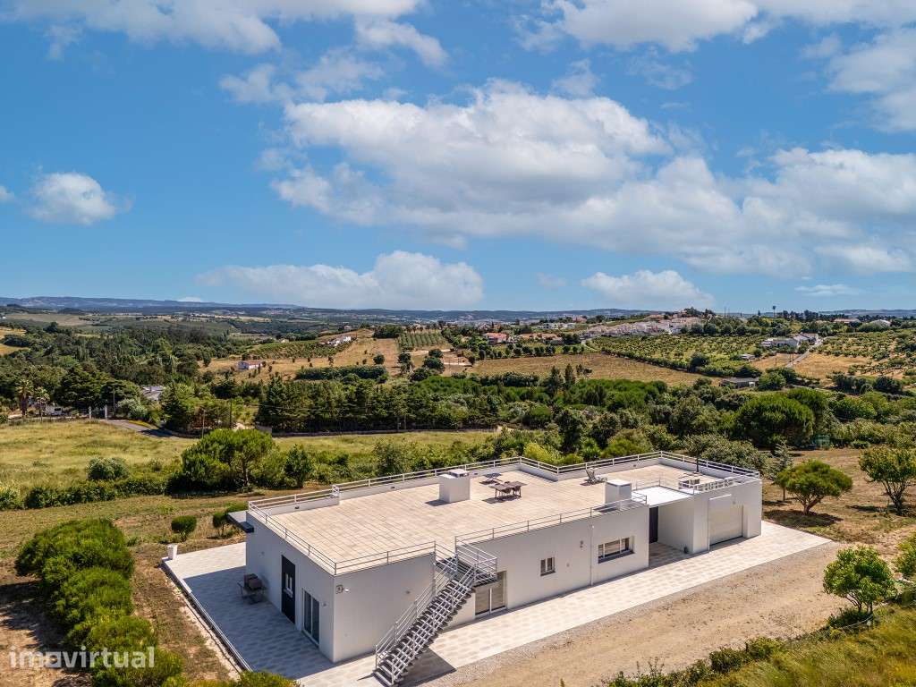 Moradia com amplo terreno e vista deslumbrante de campo e serra! - Grande imagem: 2/43