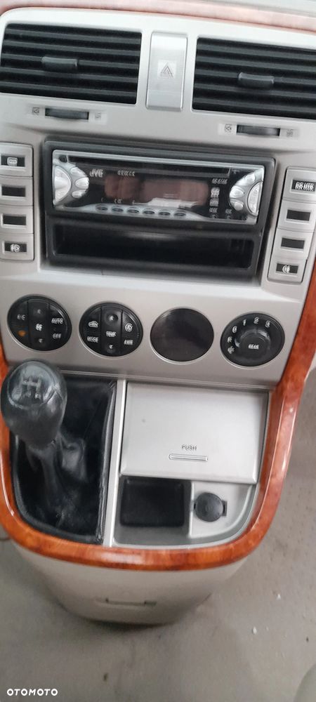 blotnik prawy lampa  Kia Carnival I  99-06r - 8