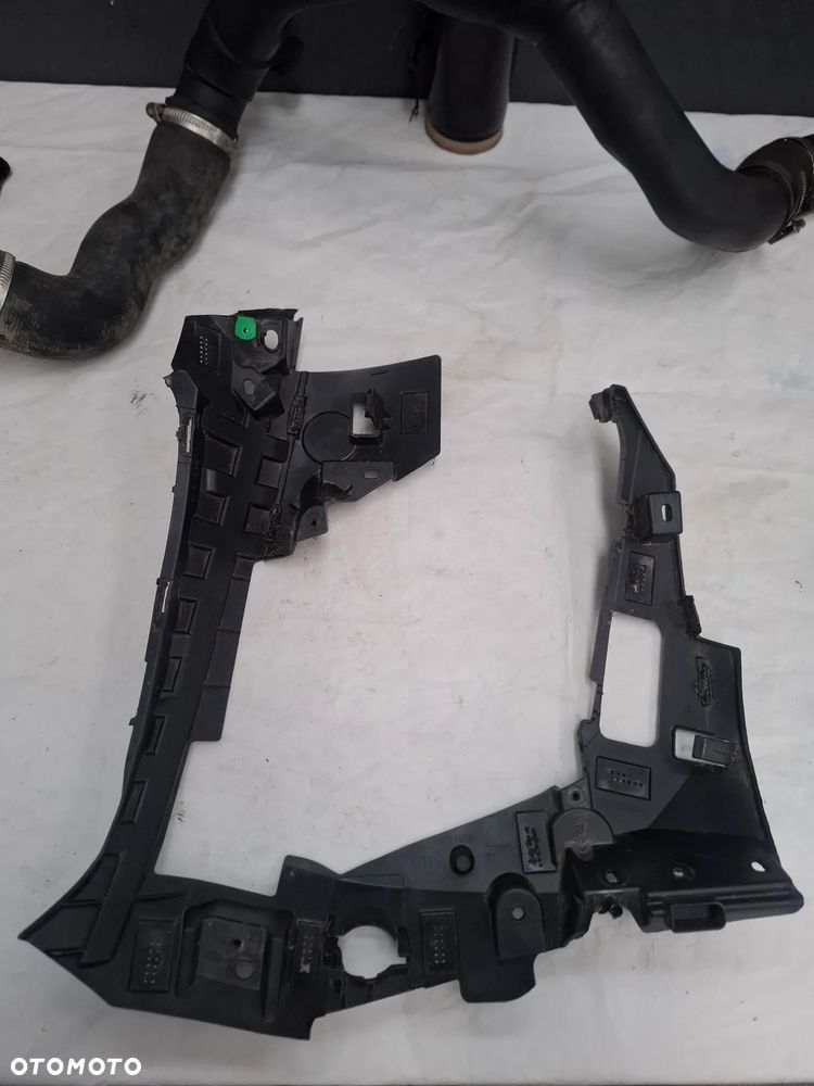 Peugeot 208 Wspornik zderzaka przedni 9855781280 - 1