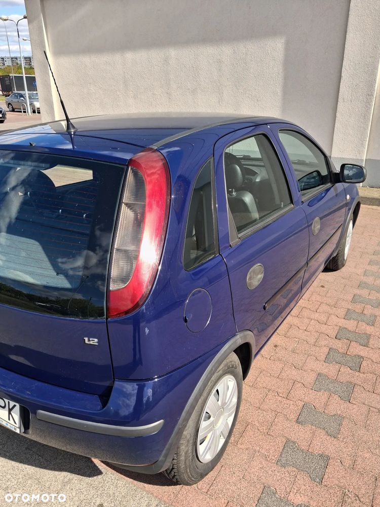 Opel Corsa 1.2 16V Cosmo - 8