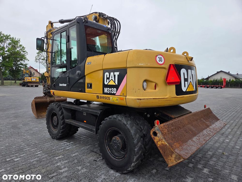 Caterpillar M313D / spr. ze Szwajcarii / - 3