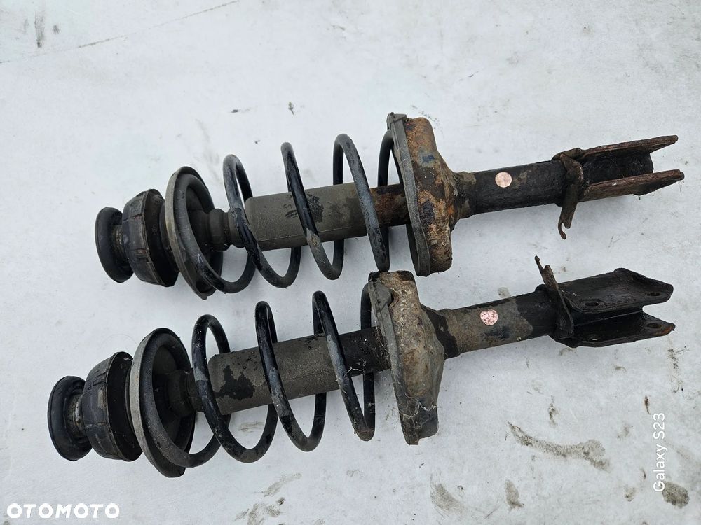 Amortyzator sprężyna McPherson lewy prawy przód Renault Clio II Lift 1,2 2005r - 1