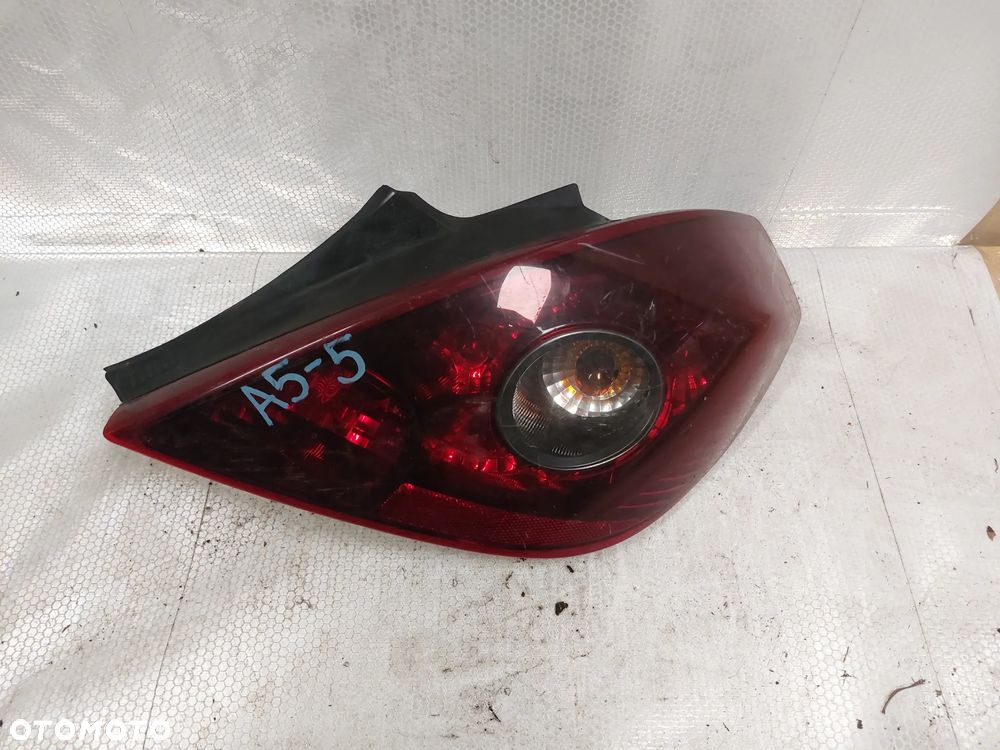 .  LAMPA TYL TYLNA PRAWA OPEL CORSA D !3D ! ! CIEMNA ! - 1