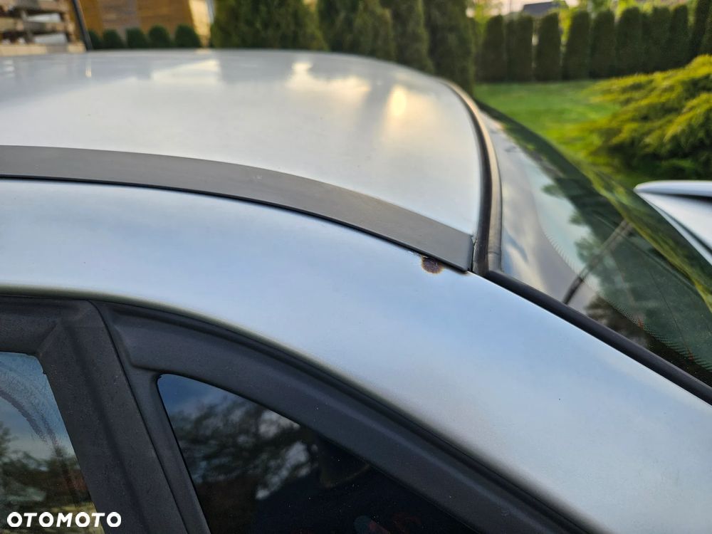 Opel Astra 1.6 16v 100 - 12
