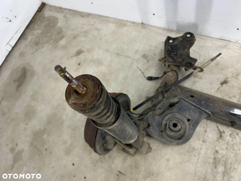 Belka zawieszenia Dacia Logan 1 I MCV kombi VAN 05-14r. DOSTAWCZAK tylna oś wózek amortyzatory ABS - 20