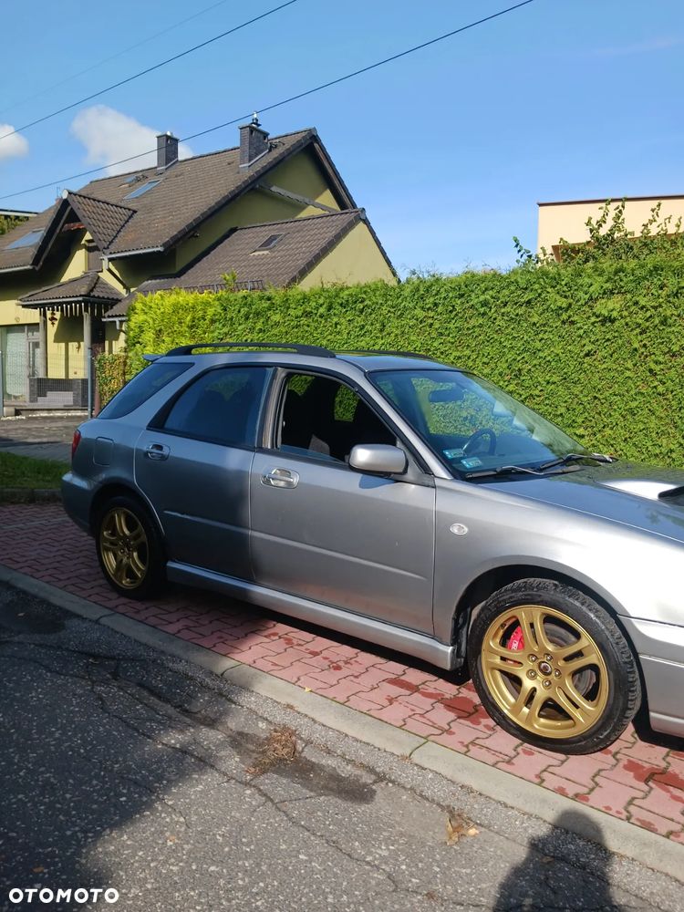 Subaru Impreza ver-kombi-02--05 - 10