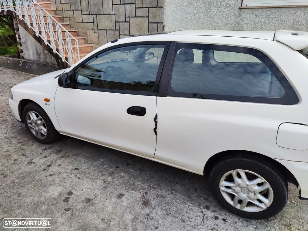 Mazda 323 P 1.3 TA - 10
