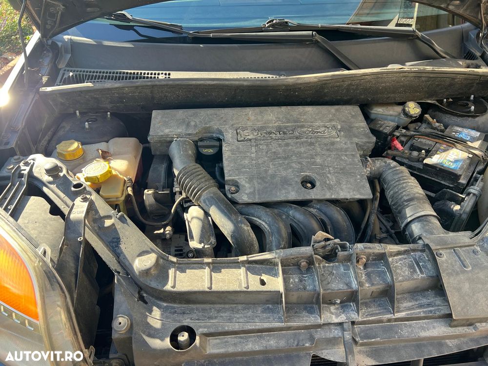 Ford Fusion 1.4 + - 9