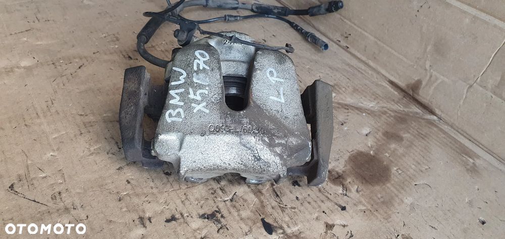 Zacisk hamulcowy lewy przód przedni lewy BMW X5 E70 3.0D - 3