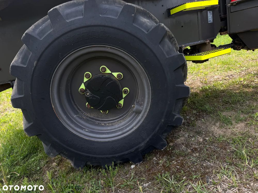 Terex Mecalac TA6s Wozidło wózek z Obrotową Kolebą. 6 ton ładowność. 4x4. Silnik Perkins. 4 cylindry. 808 mtg. 2022 rok. Kamera z wielkim Ekranem! Jazda Rewers 3prędkości. Maszyna jak Nowa z Norweskiego Gospodarstwa! Ani deka luzów i wycieków! Hydrostatic. Pełny Oryginał. Hamulce brzytwa. Serwisy w DEKRA. Maszyna Woziła lekkie ładunki. Praktycznie zerowe zużycie. Wielka Okazja. Wszystko w pełnym Oryginale. Opony Oryginał wszystkie jak Nowe. Komendy Głosowe w maszynie! - 26