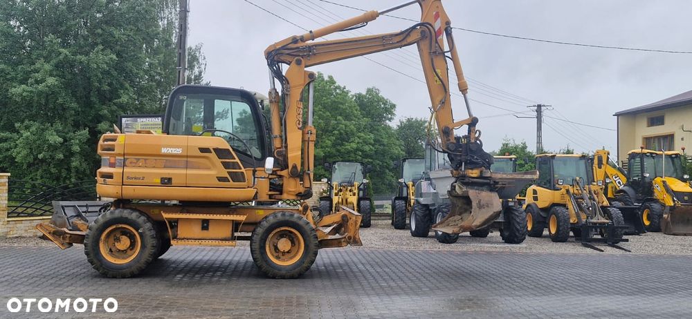 Case WX125/ Rototilit Engcon/ Maszyna sprowadzona/ - 16