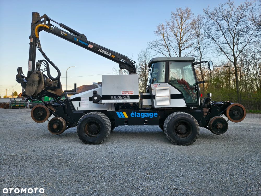 Caterpillar UNAC 300RR Mulczer kolejowy Liebherr atlas dwudrogowy zw - 4