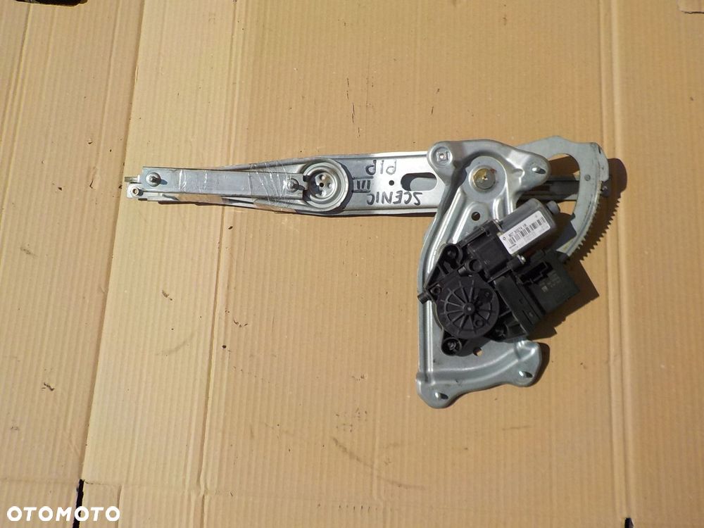 silniczek podnośnik szyby prawy przód renault scenic III 807302741R - 1