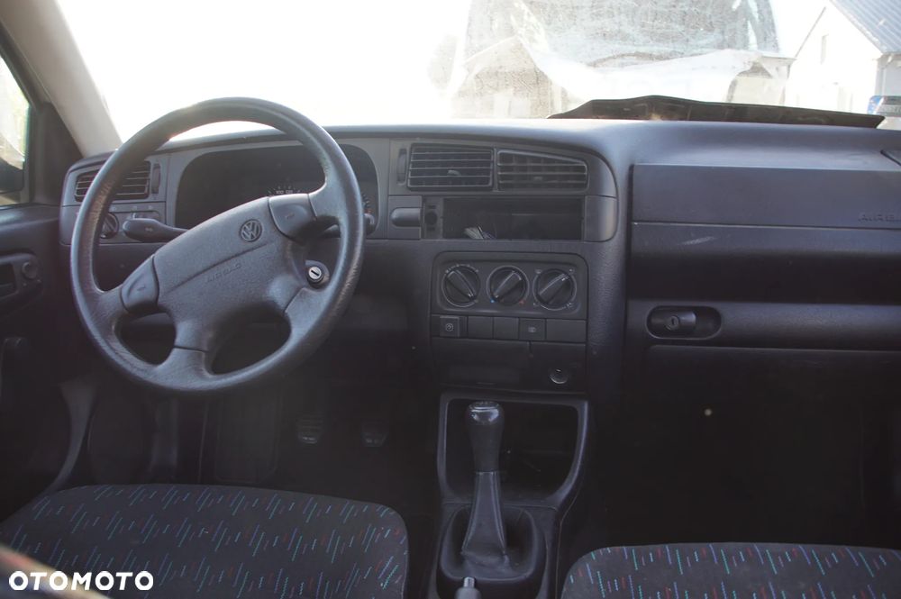 Auto na części - Volkswagen Golf III 1.4 8V 60 KM AEX DGL LB9A 1996R Silnik Skrzynia Drzwi Szyba Lusterko Błotnik Klapa Zderzak Deska Kokpit Sterownik Moduł Czujnik Licznik Kierownica - 14