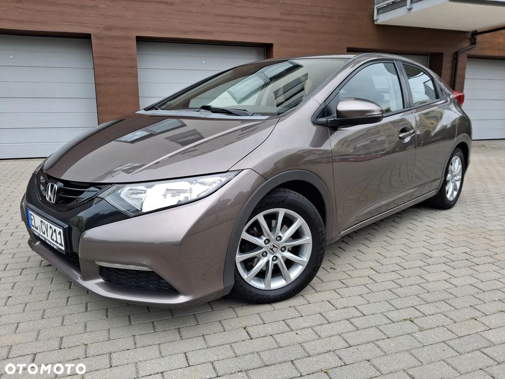 Honda Civic 1.4 i-VTEC Comfort 40 Jahre Edition - 1