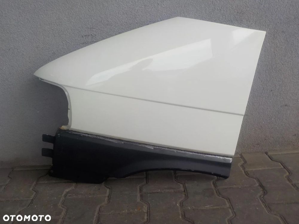 VW T4 CARAVELLE LIFT BŁOTNIK LEWY PRZÓD - 1