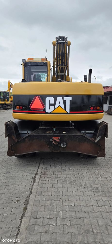 Caterpillar <<CAT M313C, Rotatilt Engcon z 2017r szczypce, szybka skrzynia, centralne smarowanie,TOP!!>> - 7