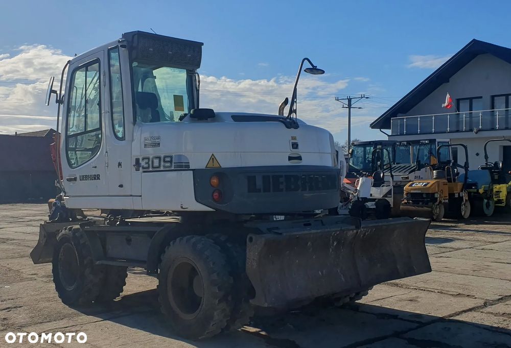 Liebherr A 309 - 4