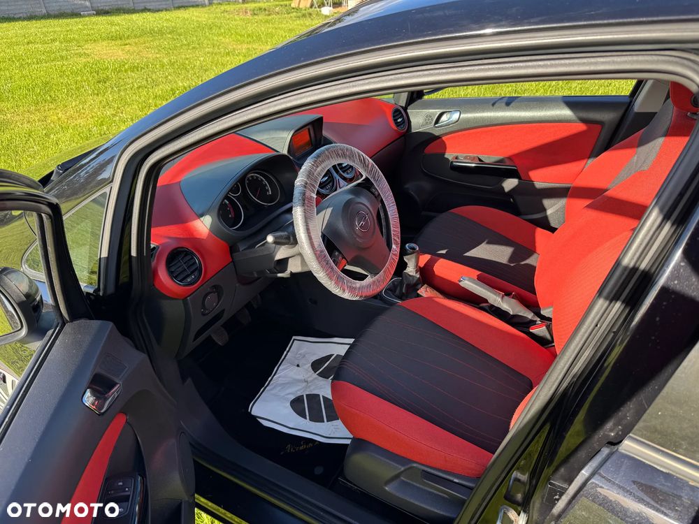 Opel Corsa 1.2 16V Cosmo - 8