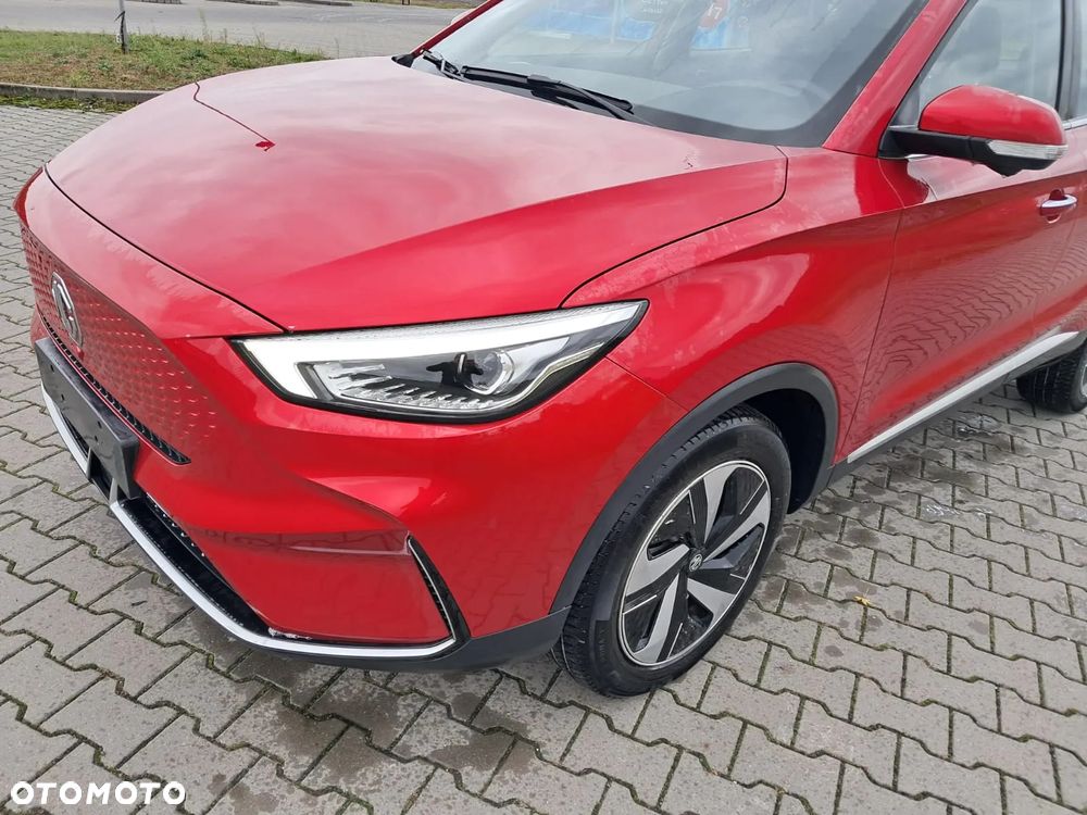 MG ZS EV 2022 LAMPA LEWY PRZÓD BŁOTNIK LEWY PRZÓD PAS PRZEDNI CHŁODNICE BELKA - 2