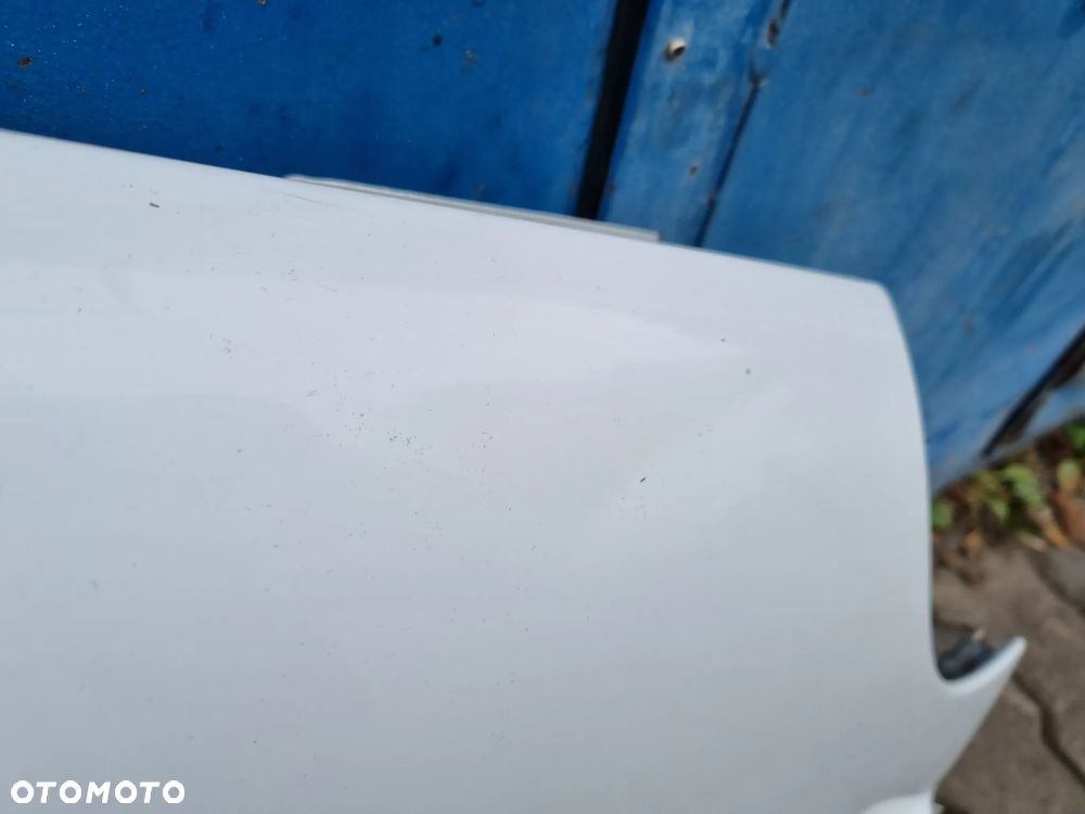 BŁOTNIK LEWY BIAŁY PRIMASTAR TRAFIC VIVARO  01-14r. - 3