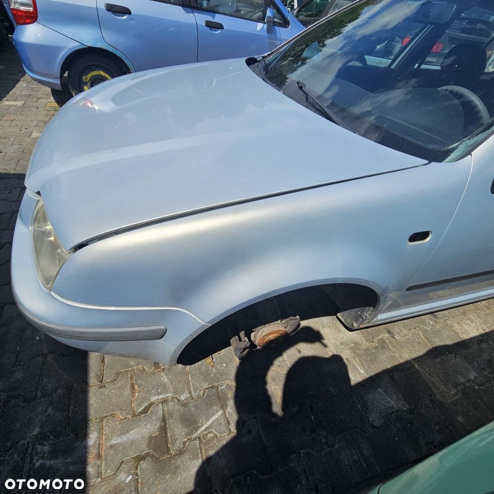 Błotnik przedni / błotniki przednie / prawy lewy przód  / VOLKSWAGEN BORA (1999r) (kod lak: LB7Z) - 1