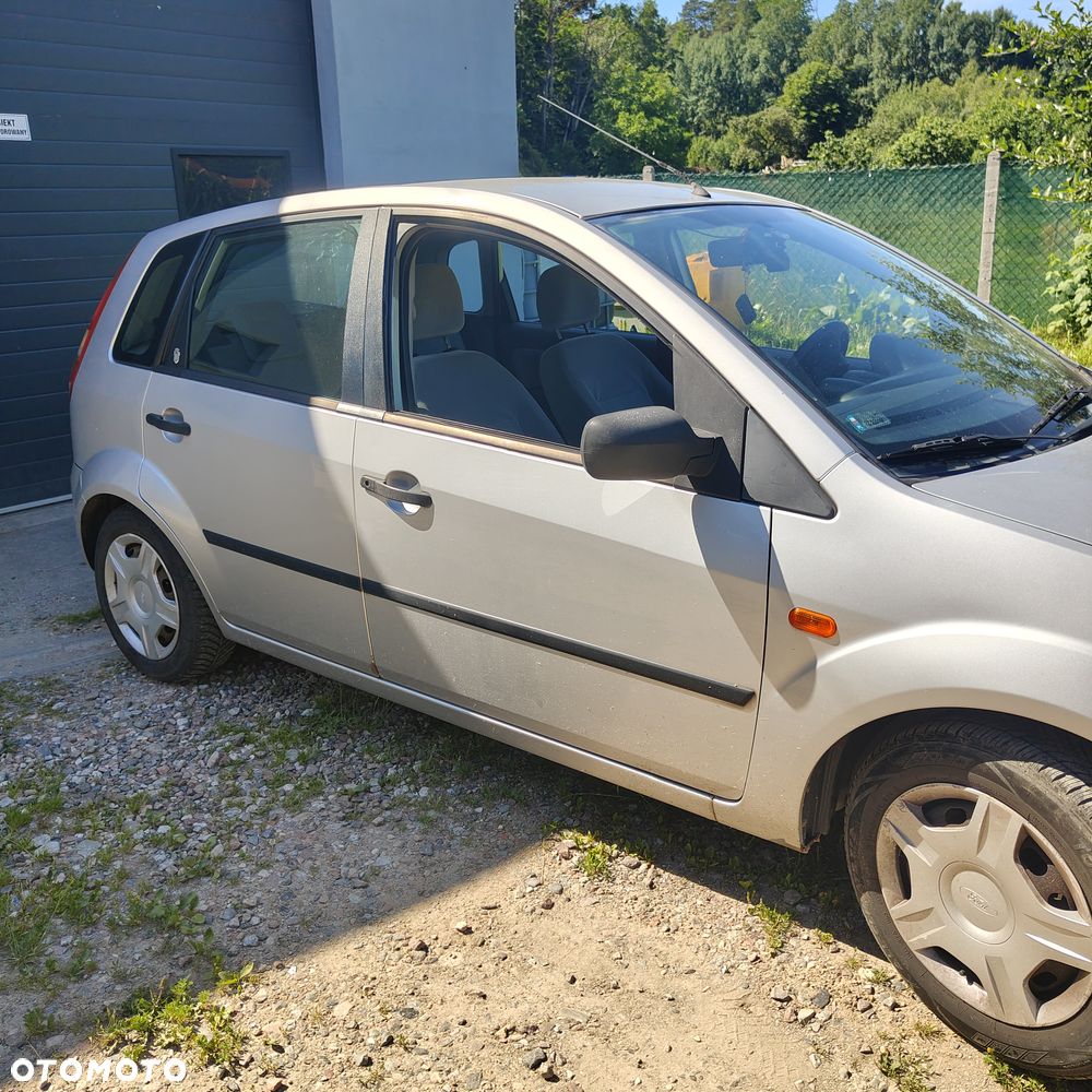 Ford Fiesta 1.4 Ghia - 12