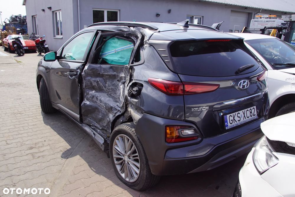 Auto na części - Hyundai Kona I 1.6 T-GDI 177 KM G4FJ D7UF1 YG7 2019R Silnik Skrzynia Drzwi Maska Błotnik Zderzak Klapa Lampa Lusterko Klamka Szyba Deska Kokpit Sterownik Moduł Czujnik Licznik Wyświetlacz Panel Kierownica - 6