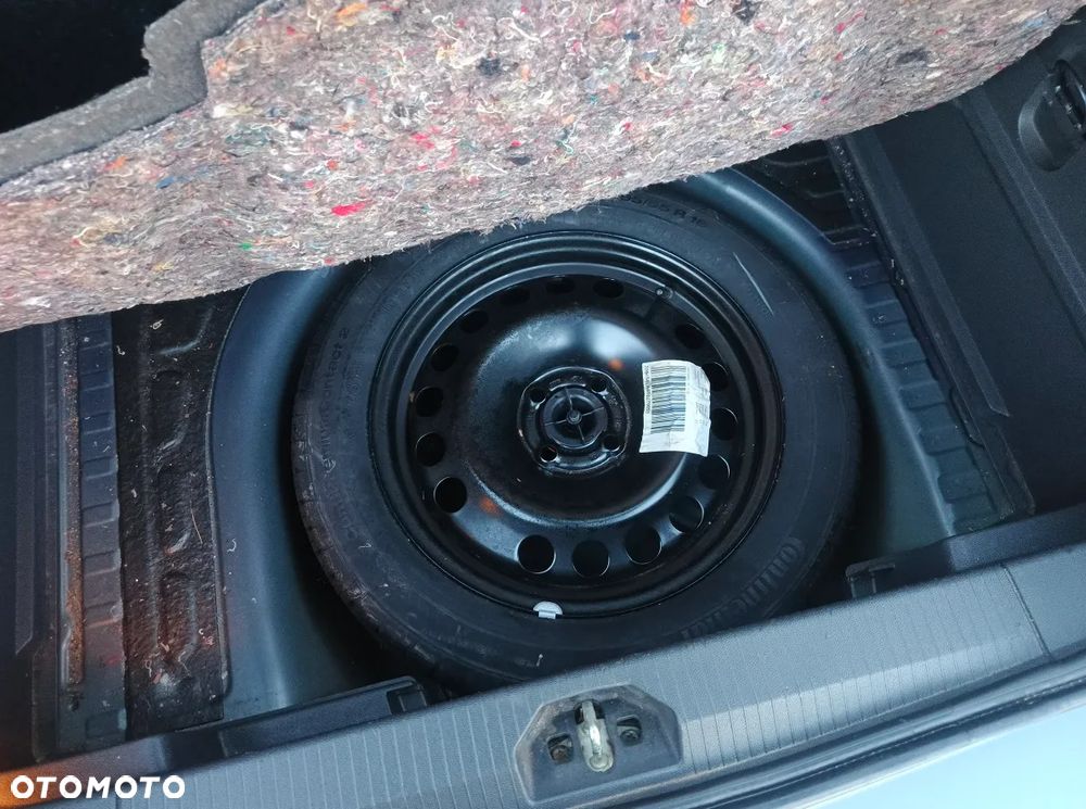 Opel Corsa 1.4 16V Enjoy - 21