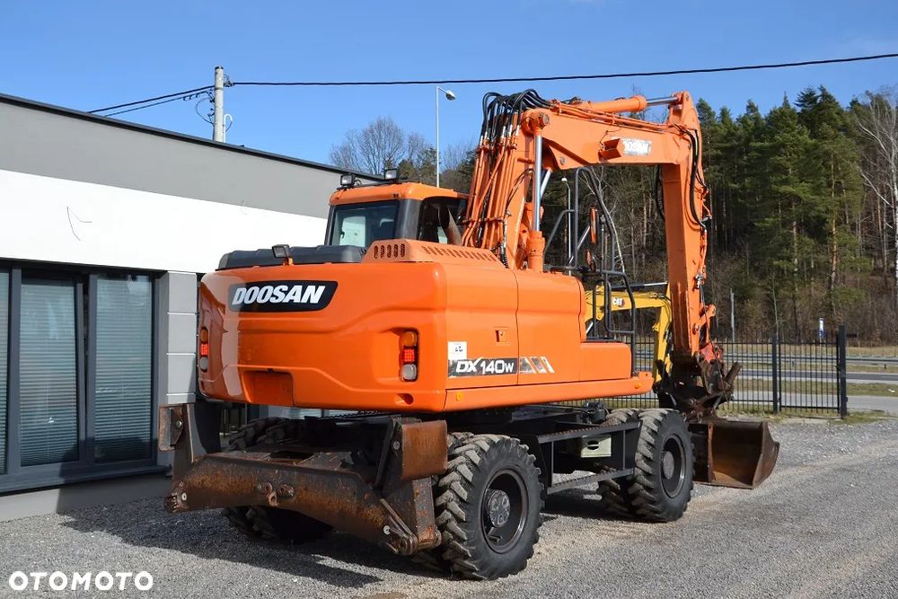 Doosan DX 140 W - 9