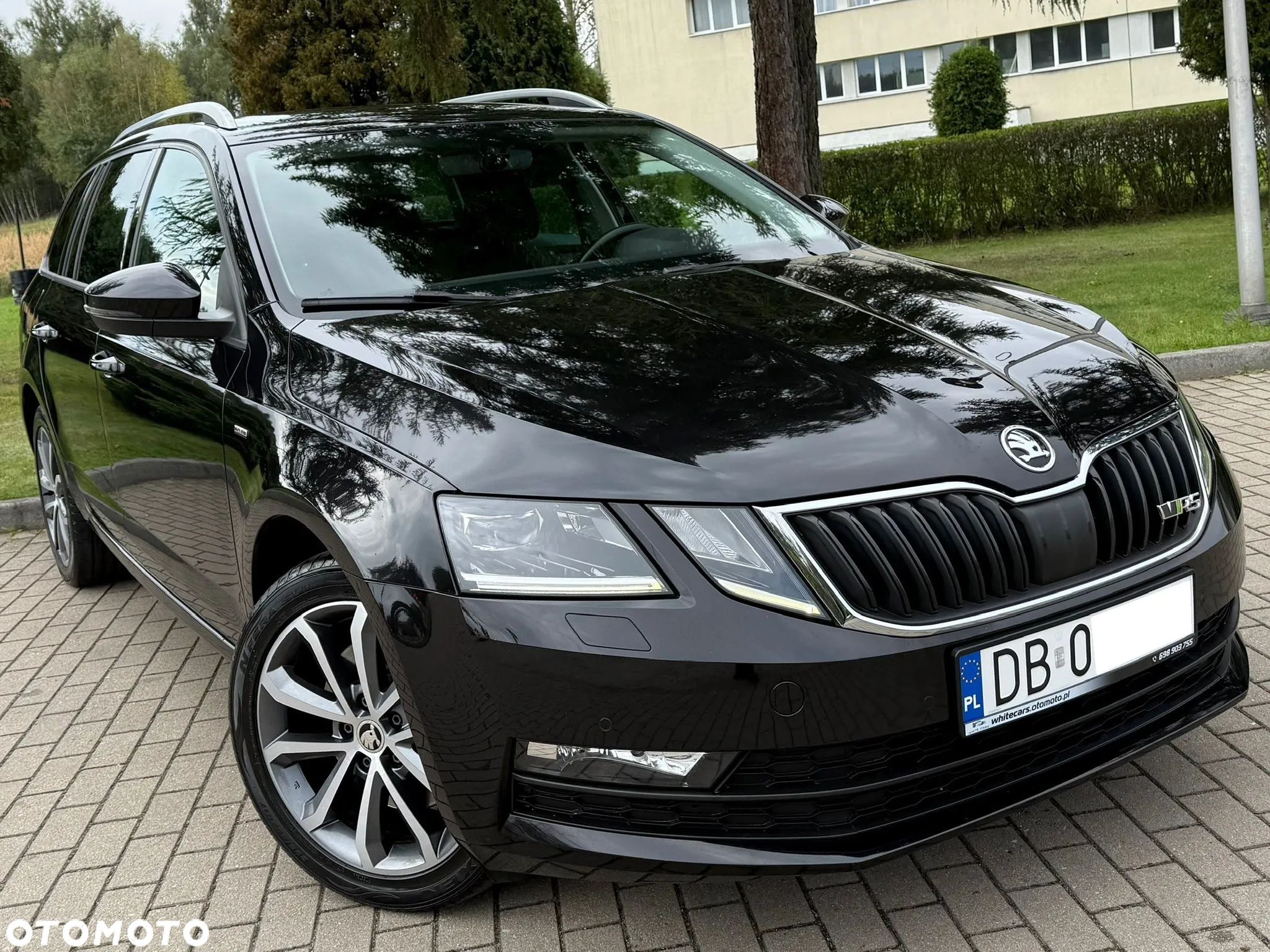 Skoda Octavia Combi 2.0 TDI DSG Exclusive - 1
