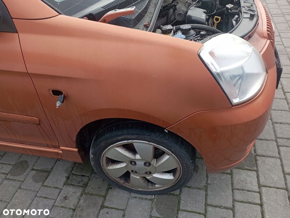 KIA PICANTO I BŁOTNIK PRAWY PRZÓD PRZEDNI - 1