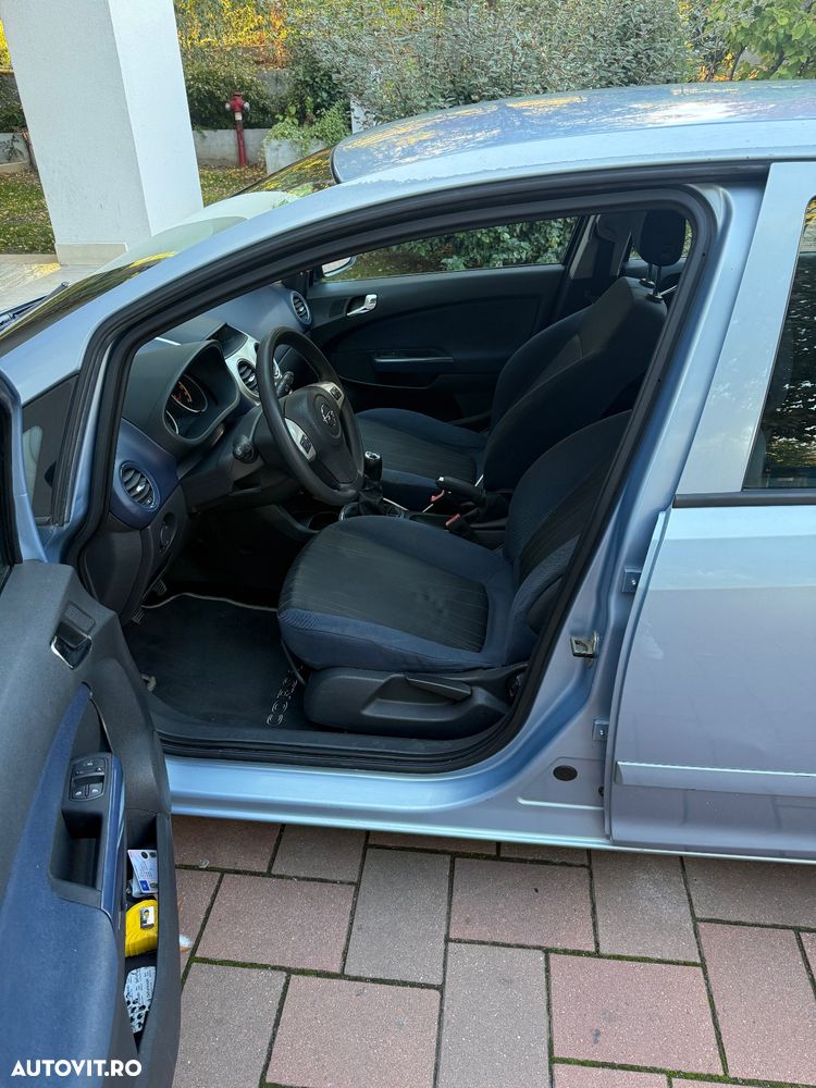 Opel Corsa 1.2i Cosmo - 7