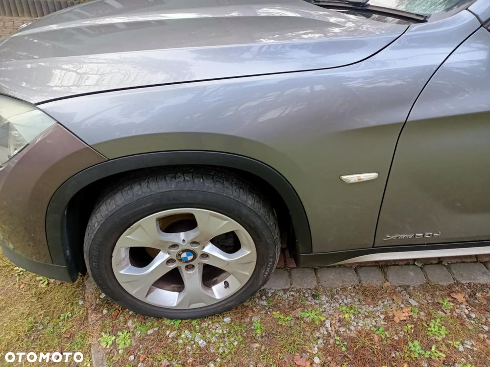 Błotnik przód przedni lewy BMW E84 X1 A52 spacegrau idealny