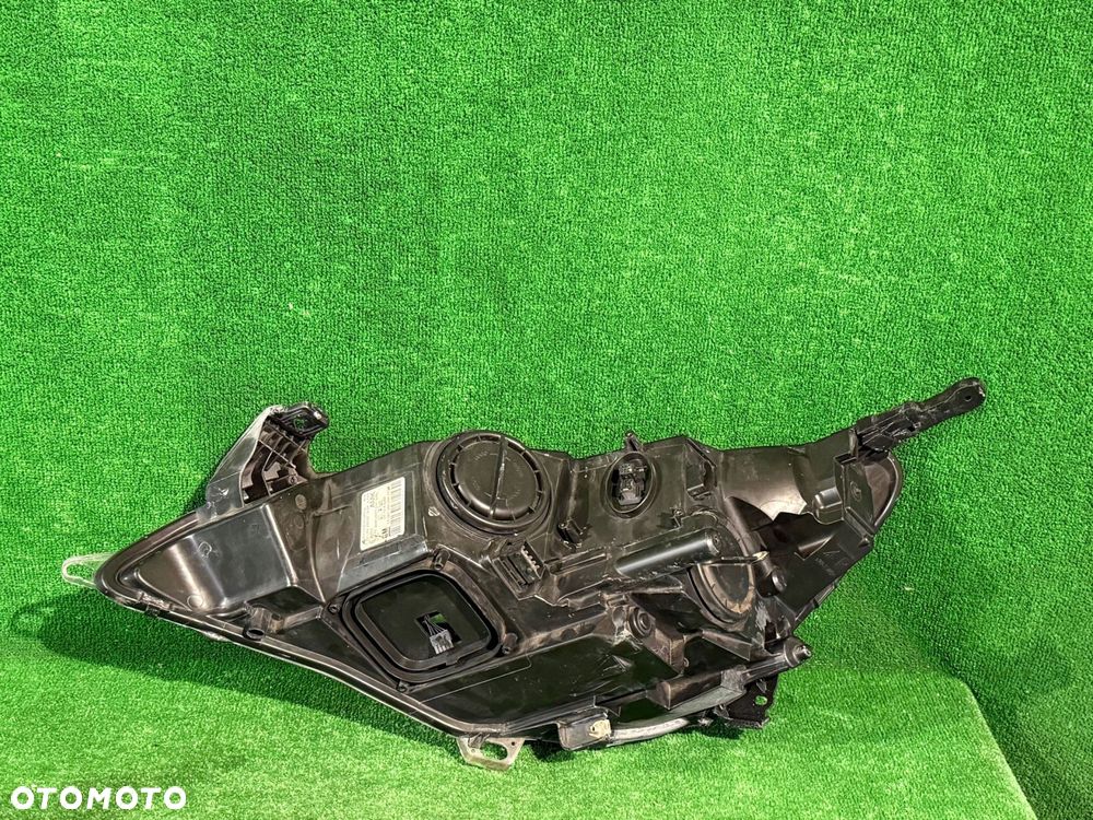 REFLEKTOR PRAWY OPEL ASTRA J GTC XENON NR:667 - 4