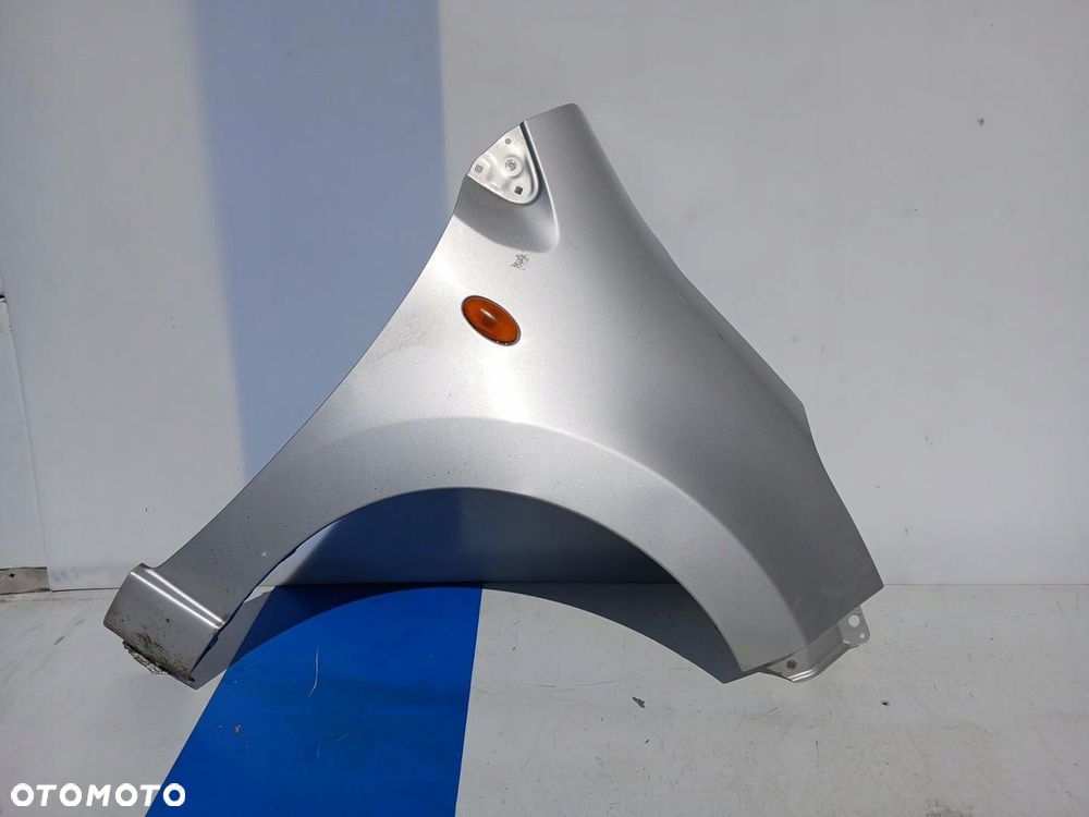 BŁOTNIK PRZÓD PRZEDNI PRAWY NISSAN PIXO SREBRNY - 1